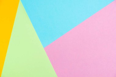 Kağıt düz renkli pastel yatıyordu üstten görünüm, arka plan dokusu, pembe, mor, sarı, bej, yeşil ve mavi renk.