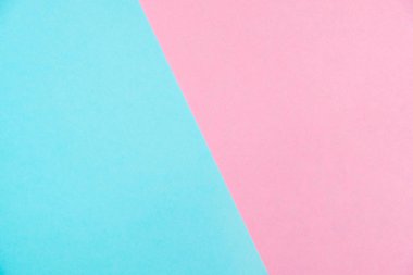 Kağıt düz renkli pastel yatıyordu üstten görünüm, arka plan dokusu, pembe ve mavi renk.