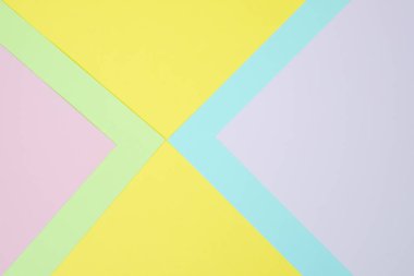 Kağıt düz renkli pastel yatıyordu üstten görünüm, arka plan dokusu, pembe, mor, sarı, bej, yeşil ve mavi renk.