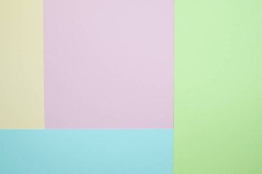 Moda pastel kağıt düz renkli yatıyordu üstten görünüm, geometrik arka plan dokusu, pembe, mor, sarı, bej, yeşil ve mavi renk.