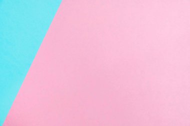 Kağıt düz renkli pastel yatıyordu üstten görünüm, arka plan dokusu, pembe ve mavi renk.