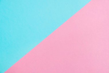 Kağıt düz renkli pastel yatıyordu üstten görünüm, arka plan dokusu, pembe ve mavi renk.