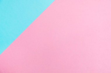 Kağıt düz renkli pastel yatıyordu üstten görünüm, arka plan dokusu, pembe ve mavi renk.