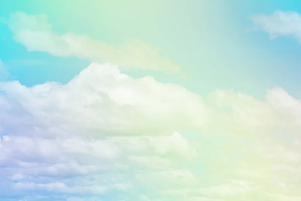 Sweet pastel colored cloud and sky with sun light, soft cloudy with gradient pastel color background. summer concept.