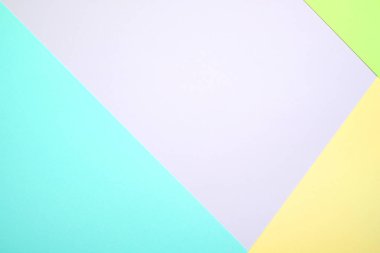 Moda pastel kağıt düz renkli yatıyordu üstten görünüm, geometrik arka plan dokusu, pembe, mor, sarı, bej, yeşil ve mavi renk.