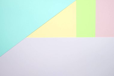 Moda pastel kağıt düz renkli yatıyordu üstten görünüm, geometrik arka plan dokusu, pembe, mor, sarı, bej, yeşil ve mavi renk.
