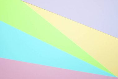 Moda pastel kağıt düz renkli yatıyordu üstten görünüm, geometrik arka plan dokusu, pembe, mor, sarı, bej, yeşil ve mavi renk.