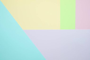 Moda pastel kağıt düz renkli yatıyordu üstten görünüm, geometrik arka plan dokusu, pembe, mor, sarı, bej, yeşil ve mavi renk.