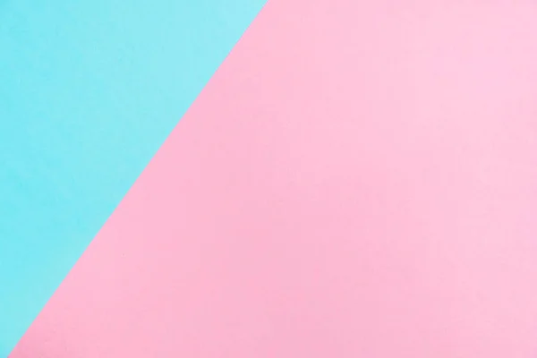 Pastel colored paper flat lay top view, background texture, pink and blue colour.