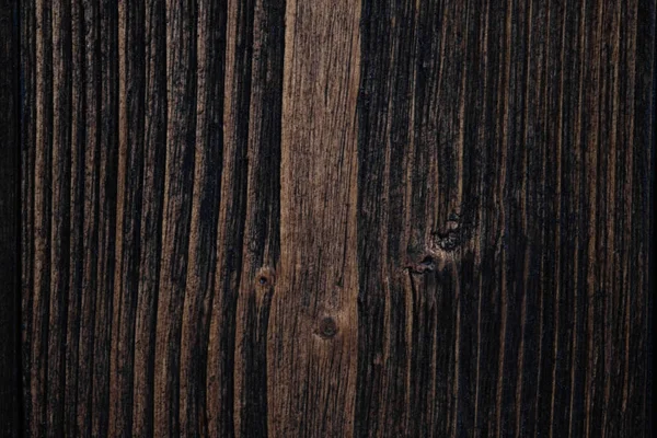 暗い茶色ウッド テクスチャのクローズ アップ自然な縞模様の背景に 木製の表面にテキストを追加または装飾芸術作品を設計 — ストック写真