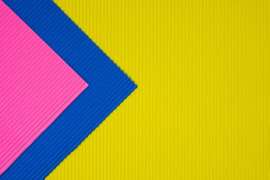 Oluklu kağıt dokusu, kullanım arka plan için çok renkli. kopya alanı için canlı renkli metin veya nesne eklemek.