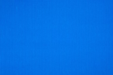 Oluklu kağıt doku mavi, arka planı olarak kullanabilir. kopya alanı için canlı renkli metin veya nesne eklemek.