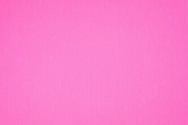 Oluklu kağıt doku pembe, arka planı olarak kullanabilir. kopya alanı için canlı renkli metin veya nesne eklemek.