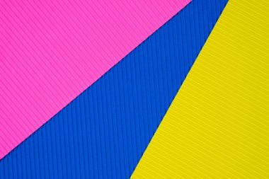 Oluklu kağıt dokusu, kullanım arka plan için çok renkli. kopya alanı için canlı renkli metin veya nesne eklemek.