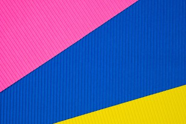 Oluklu kağıt dokusu, kullanım arka plan için çok renkli. kopya alanı için canlı renkli metin veya nesne eklemek.