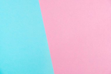 Kağıt düz renkli pastel yatıyordu üstten görünüm, arka plan dokusu, pembe ve mavi renk.