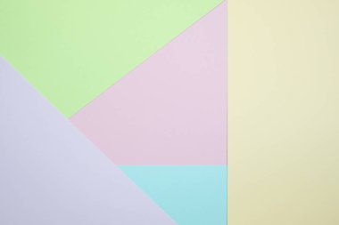 Moda pastel kağıt düz renkli yatıyordu üstten görünüm, geometrik arka plan dokusu, pembe, mor, sarı, bej, yeşil ve mavi renk.