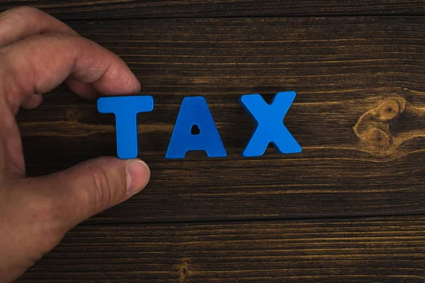 Mano Dedo Organizar Letras Texto Palabra Tax Mesa Madera Con — Foto de Stock