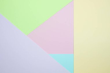 Moda pastel kağıt düz renkli yatıyordu üstten görünüm, geometrik arka plan dokusu, pembe, mor, sarı, bej, yeşil ve mavi renk.