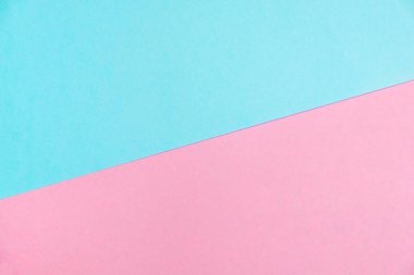 Kağıt düz renkli pastel yatıyordu üstten görünüm, arka plan dokusu, pembe ve mavi renk.