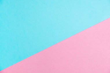 Kağıt düz renkli pastel yatıyordu üstten görünüm, arka plan dokusu, pembe ve mavi renk.
