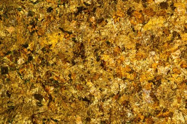 Parlak sarı altın yaprak veya artıklar altın folyo arka plan doku, arka of Buda resim yüzey.