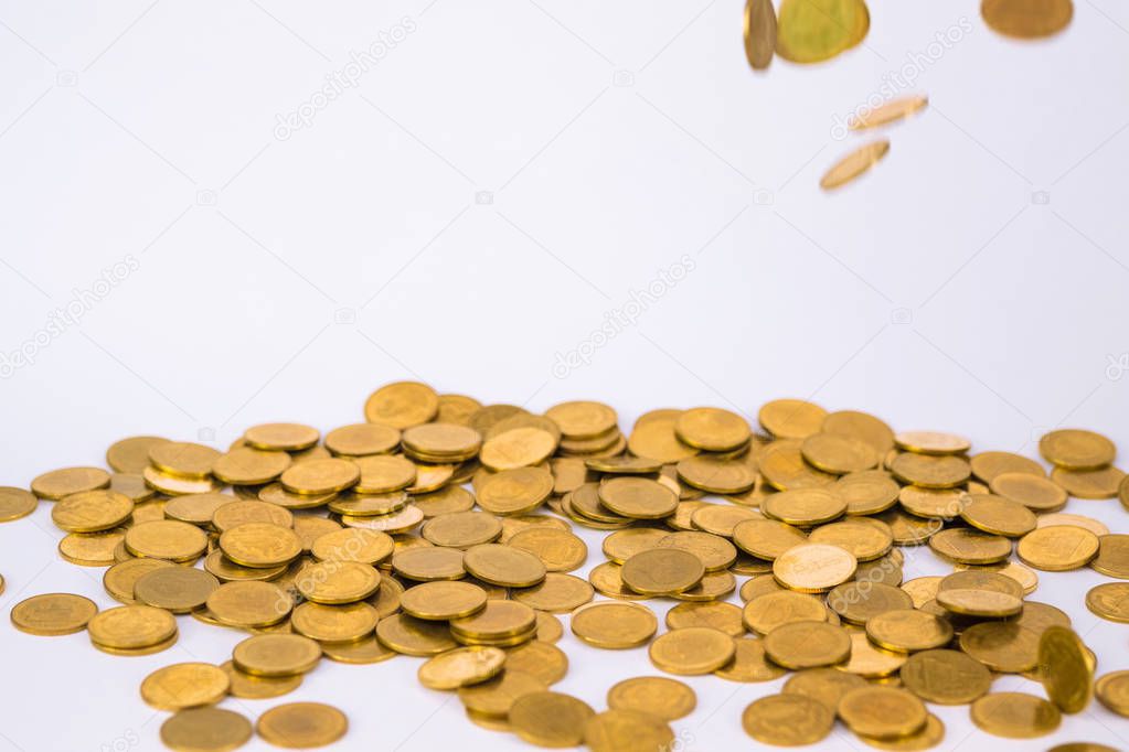 Movement of falling gold coin, flying coin, rain money with soft shadow on white background, business and financial wealth and take profit concept idea.