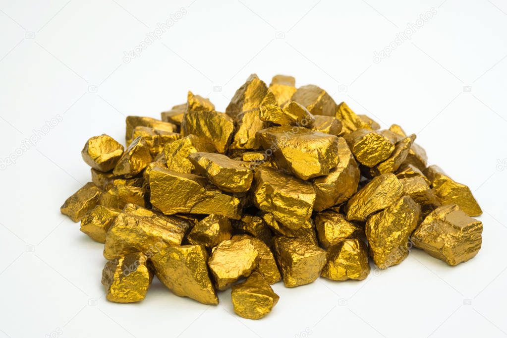 A pile of gold nuggets or gold ore isolated on white background, precious stone or lump of golden stone, financial and business concept idea.