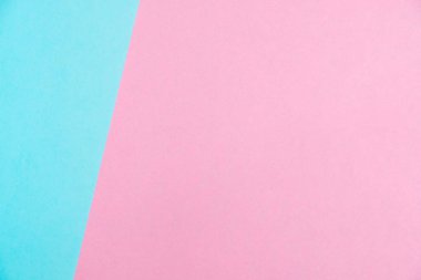 Kağıt düz renkli pastel yatıyordu üstten görünüm, arka plan dokusu, pembe ve mavi renk.