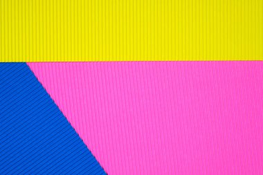 Oluklu kağıt dokusu, kullanım arka plan için çok renkli. kopya alanı için canlı renkli metin veya nesne eklemek.