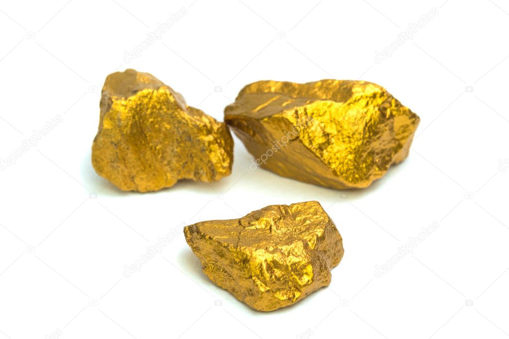 A pile of gold nuggets or gold ore on white background, precious stone or lump of golden stone, financial and business concept idea.