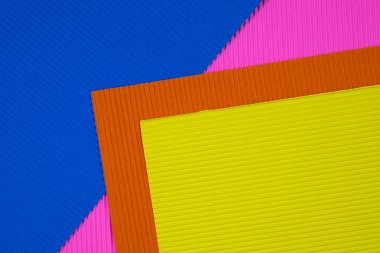 Oluklu kağıt dokusu, kullanım arka plan için çok renkli. kopya alanı için canlı renkli metin veya nesne eklemek.