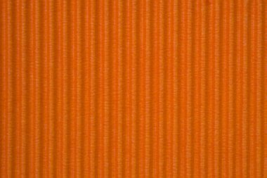 Turuncu oluklu kağıt dokusu, arka plan için kullanın. kopya alanı için canlı renkli metin veya nesne eklemek.