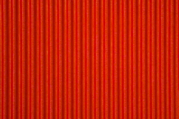 Tekstur kertas bergelombang merah, digunakan untuk latar belakang. warna hidup w — Stok Foto