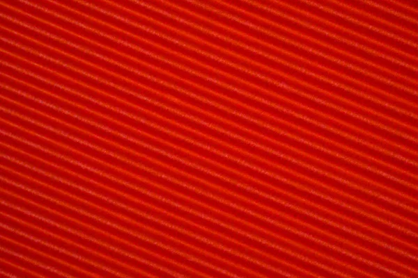 Textura de papel corrugado rojo, uso para el fondo. color vivo w — Foto de Stock