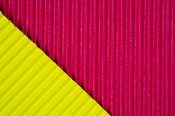 Червоно-жовта гофрована паперова текстура, використання для фону. яскравий — стокове фото