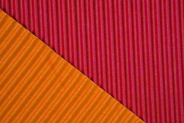 Tekstura papieru falistego czerwony i pomarańczowy, użycie tła. VIV — Zdjęcie stockowe