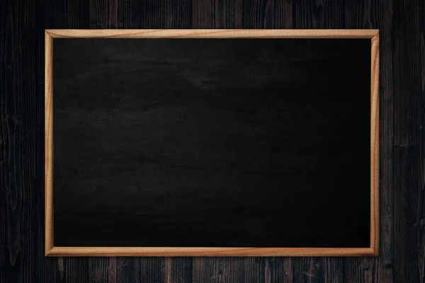 Abstract blackboard or chalkboard with frame on wooden backgroun — Stock Photo, Image