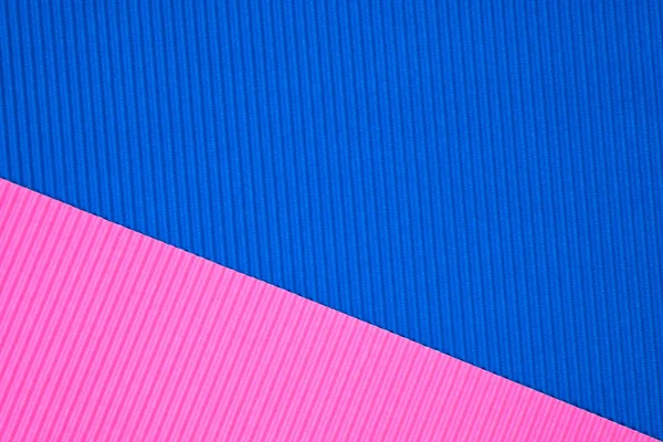 Синьо-рожева гофрована паперова текстура, використовується для фону. випущений — стокове фото