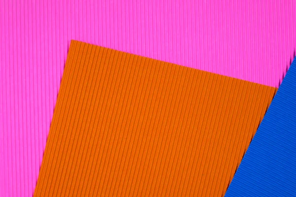 Multi gekleurd gegolfd papier textuur, gebruik voor achtergrond. Viv — Stockfoto