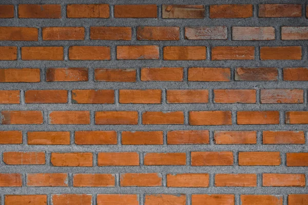 Fragmento de pared de ladrillo rojo fondo o ladrillo capa construcción textu — Foto de Stock