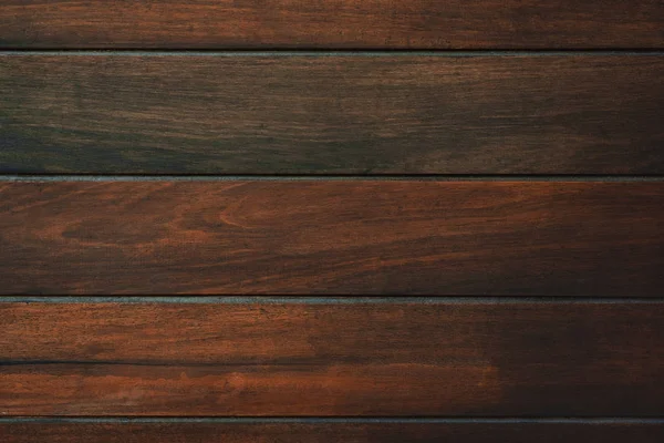 Textura de madera marrón oscuro con fondo natural rayado — Foto de Stock