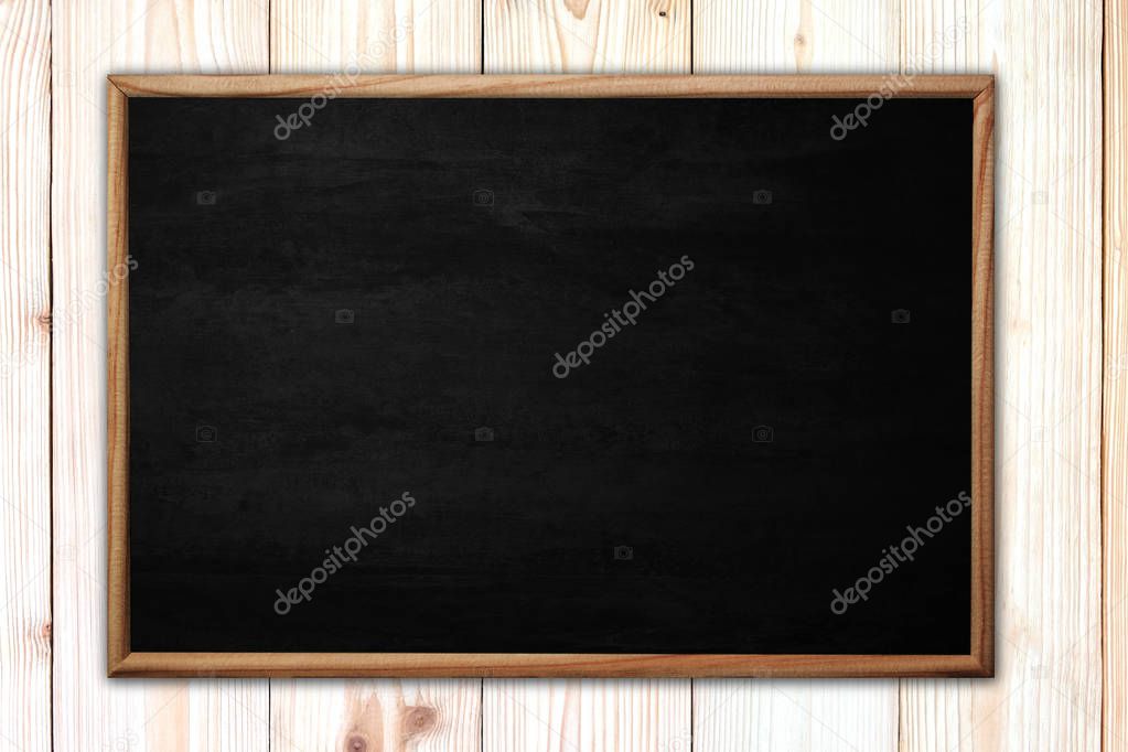 Abstract blackboard or chalkboard with frame on wooden backgroun