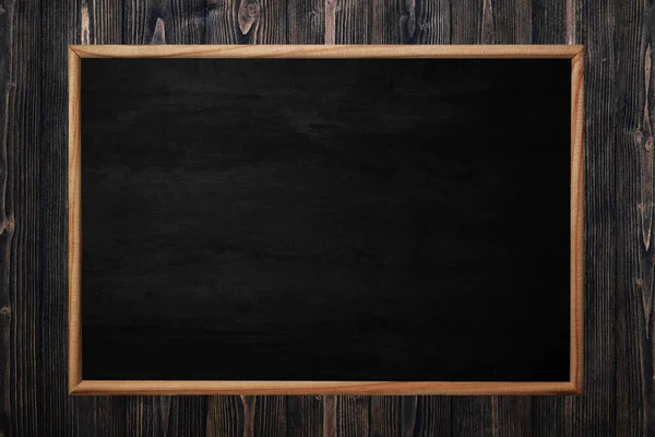 Abstract blackboard or chalkboard with frame on wooden backgroun — Stock Photo, Image