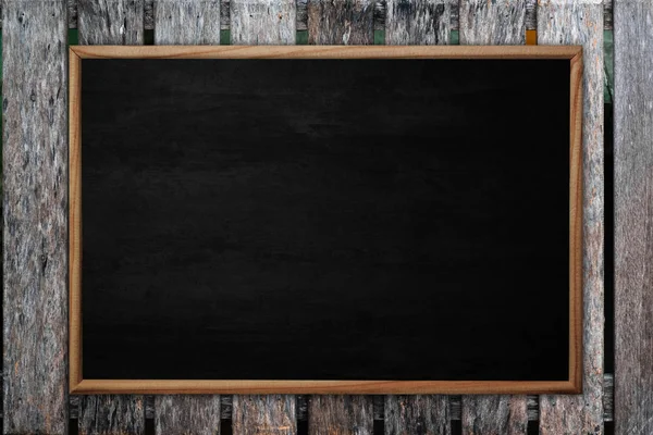 Abstract blackboard or chalkboard with frame on wooden backgroun — Stock Photo, Image