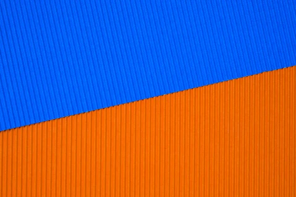 Blauwe en oranje gegolfd papier textuur, gebruik voor achtergrond. VI — Stockfoto