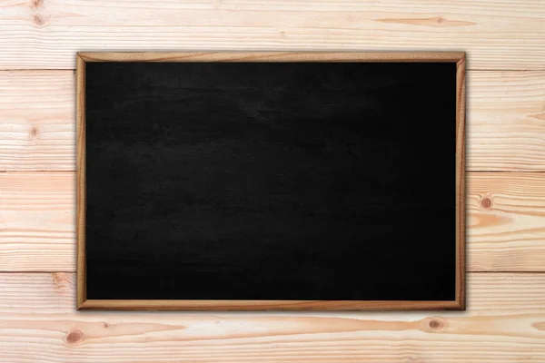 Abstrakte Tafel oder Tafel mit Rahmen auf hölzernem Hintergrund — Stockfoto
