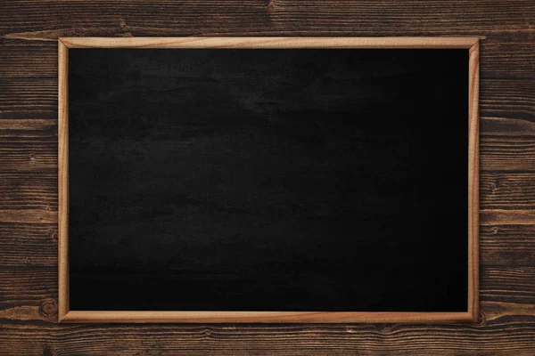 Abstract blackboard or chalkboard with frame on wooden backgroun — Stock Photo, Image