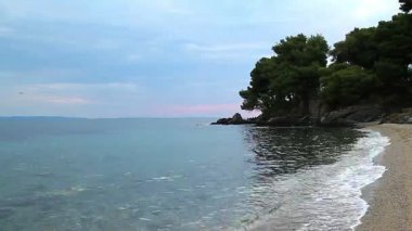 Sahil, Ege kıyısında günbatımı akşamı 