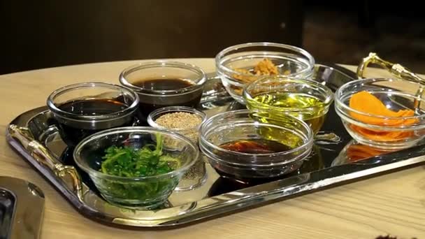 Ingtidients Coocing Sauces Oil Nuts Tray Different Sauces Glass Bowls — Stock Video